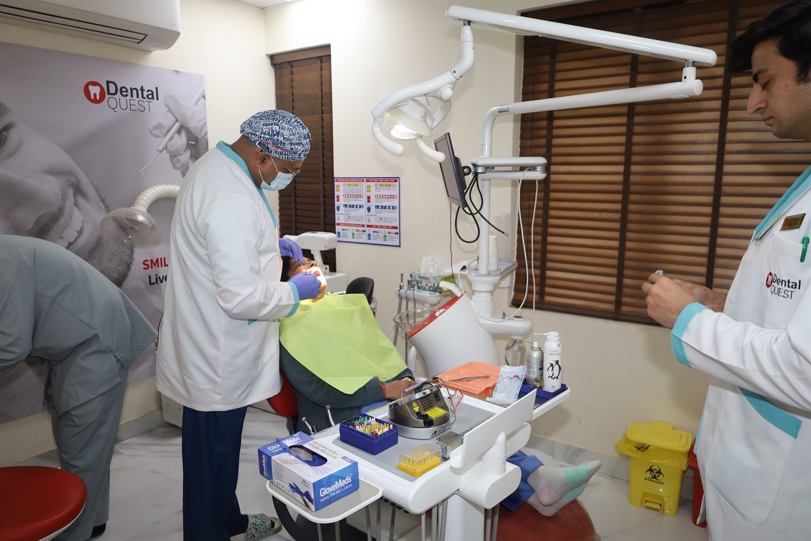 Dental Quest surgeons at work in the clinic operatory, Dwarka Sector 19